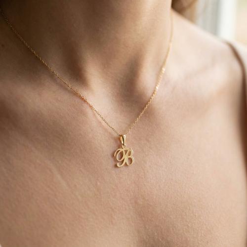 Златен медальон с инициали