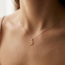 Златен медальон с инициали