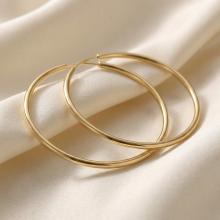 Големи златни обеци халки 70 мм Големи златни обеци халки 70 мм