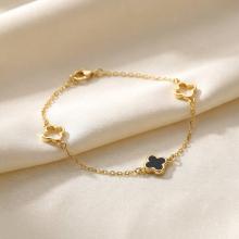 Златна гривна Детелини с оникс