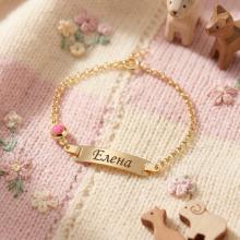 Златна детска гривна с плочка