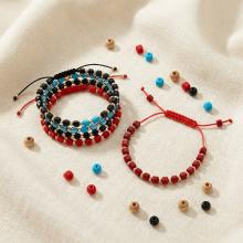 Гривна със златни топчета и тъмно червени мъниста R10 Гривна със златни топчета и тъмно червени мъниста R10