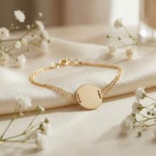 Златна гривна с кръгла плочка