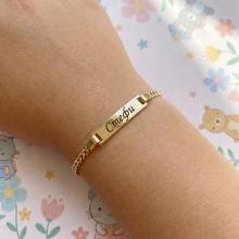 Златна детска гривна с плочка Златна детска гривна с плочка