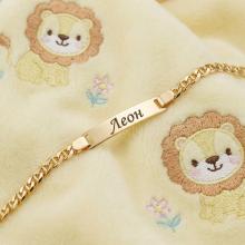 Златна детска гривна с плочка