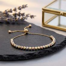 Златна гривна  Цветни топчета