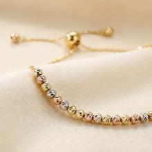 Златна гривна  Цветни топчета