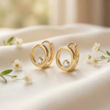 Златни обеци Камък