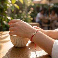 Гривна с червен конец и златно име по избор Гривна с червен конец и златно име по избор