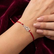 Гривна с червен конец и сребърен елемент безкрайност