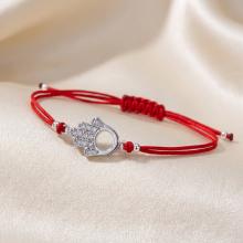 Гривна с червен конец и сребърен елемент Ръката На Фатима