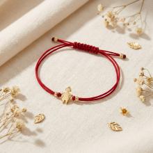 Гривна с червен конец и 14 карата златна фигура момиче Гривна с червен конец и 14 карата златна фигура момиче