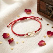 Гривна с червен конец и 14 карата златен елемент безкрайност