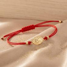 Гривна с червен конец и златен елемент Богородица