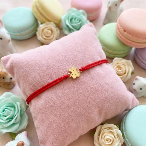 Гривна с червен конец и 14 карата златен елемент мече