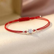 Гривна с червен конец и сребърен елемент с циркон