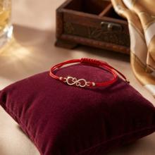 Гривна с червен конец и 14 карата златен елемент безкрайност