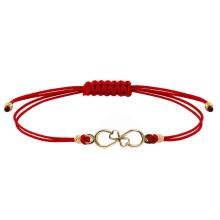 Гривна с червен конец и 14 карата златен елемент безкрайност