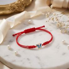 Гривна с червен конец и златен елемент Пеперуда