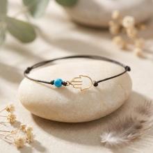 Гривна с черен конец и златен елемент Ръката На Фатима