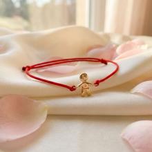 Гривна с червен конец и 14 карата златен елемент момче