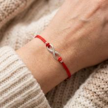 Гривна с червен конец и сребърен елемент безкрайност В93S Гривна с червен конец и сребърен елемент безкрайност В93S