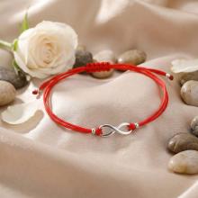 Гривна с червен конец и сребърен елемент безкрайност В93S Гривна с червен конец и сребърен елемент безкрайност В93S