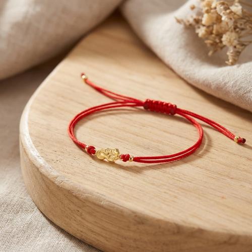 Гривна с червен конец и златен елемент Богородица с младенеца