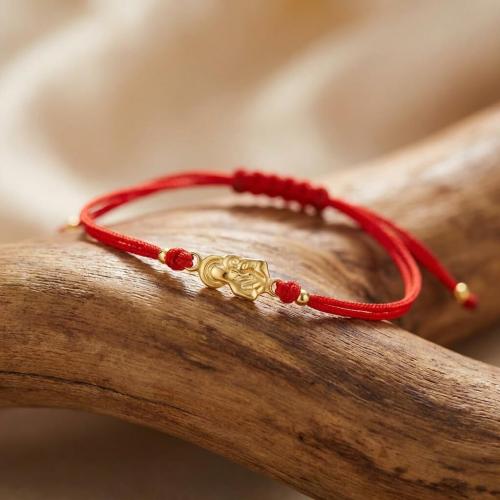 Гривна с червен конец и златен елемент Богородица с младенеца