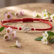 Гривна с червен конец и сребърен елемент Богородица В9