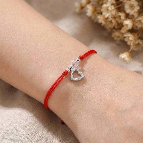 Гривна с червен конец сребърен елемент сърце и бели мъниста