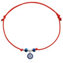 Гривна с червен конец с Dark Heliotrope и сребърен елемент синьо око