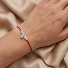 Гривна с червен конец и сребърен елемент циркон