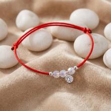 Гривна с червен конец и сребърен елемент ангелче с циркони BT112