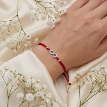 Гривна с червен конец и сребърен елемент безкрайност BT15