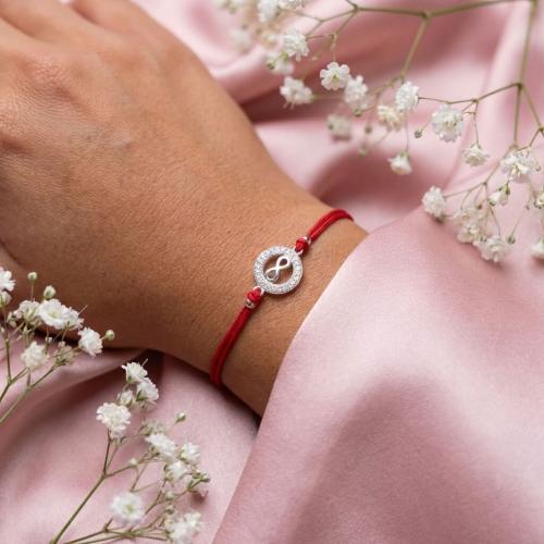 Гривна с червен конец и сребърен елемент безкрайност BT16