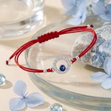 Гривна с червен конец и сребърен елемент синьо око BT17
