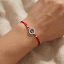 Гривна с червен конец и сребърен елемент синьо око BT17