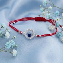 Гривна с червен конец и сребърен елемент синьо око BT17