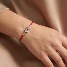 Гривна с червен конец и сребърен елемент сова