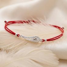 Гривна с червен конец и сребърен елемент ангелско крило BT28