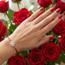 Гривна с червен конец и сребърен елемент роза с циркони