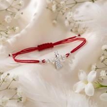 Гривна с червен конец и сребърен елемент ангелче с циркони