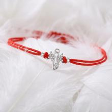 Гривна с червен конец и сребърен елемент ангелче с циркони