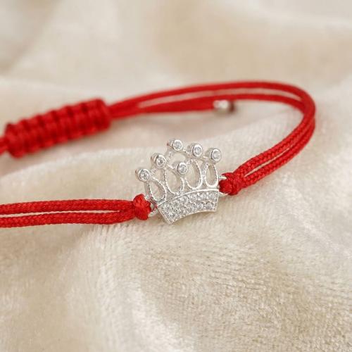 Гривна с червен конец и сребърен елемент корона с бели циркони