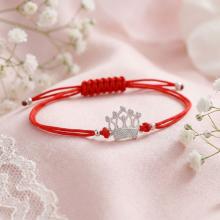 Гривна с червен конец и сребърен елемент корона с бели циркони