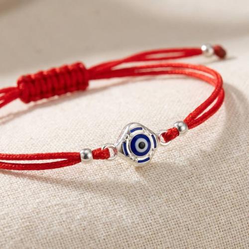 Гривна с червен конец и сребърен елемент синьо око BT96S