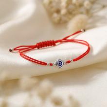 Гривна с червен конец и сребърен елемент синьо око BT96S