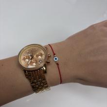 Гривна с червен конец златни топчета и синьо око Гривна с червен конец златни топчета и синьо око