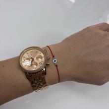 Гривна с червен конец златни топчета и синьо око Гривна с червен конец златни топчета и синьо око